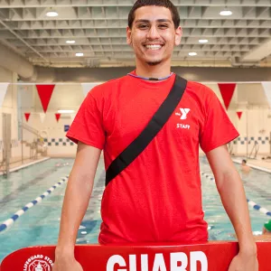 Lifeguard working at a YMCA pool in Brooklyn