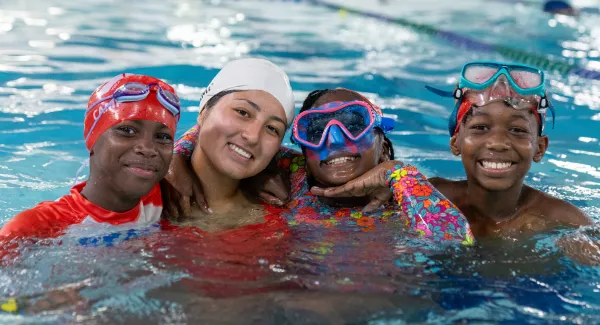 group of kids swimming