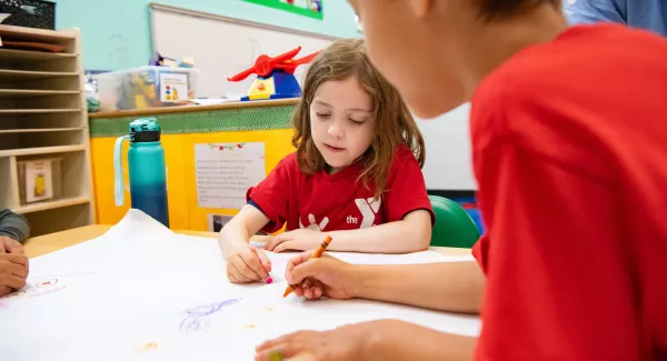 2 kids in classroom