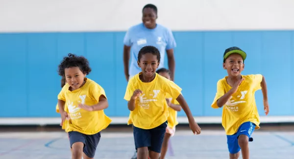 kids running in a gym