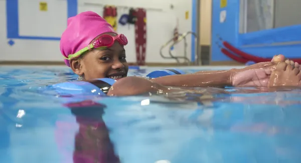 little girl swimming