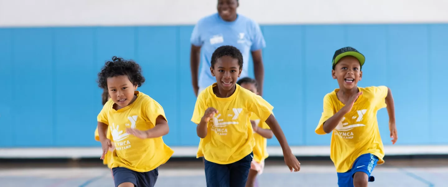 kids running in a gym