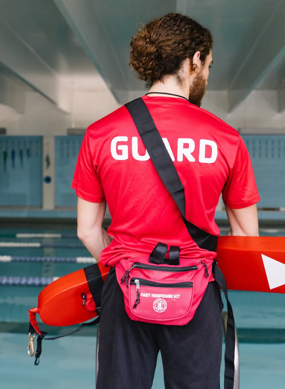lifeguard facing pool