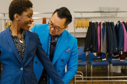 Y Step students are fitted for custom suits by Andrew Jang and Adriaen Black