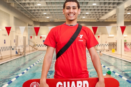 A lifeguard poolside at the YMCA.