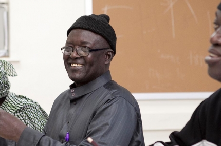 Smiling man in community class at Harlem YMCA