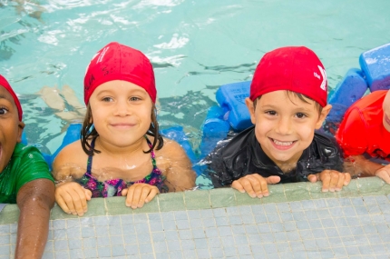 Summer campers swimming at YMCA
