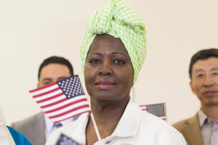 Group of new Americans with flags