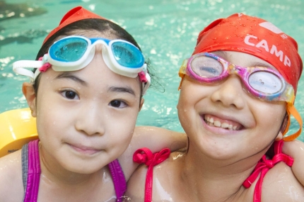 Summer campers swimming at YMCA