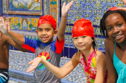Summer campers swimming at YMCA