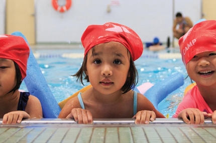 Preschoolers learn to swim at the YMCA