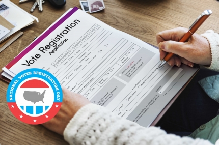 National voter registration day logo on photo of hands filling out a voter registration form