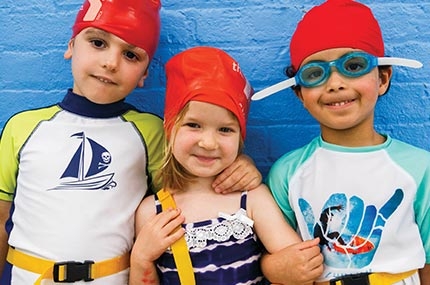 Three preschoolers ready for swim lesson
