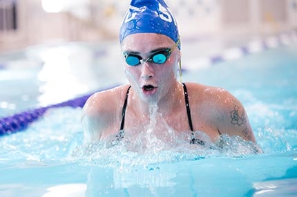 Woman swimming breaststroke