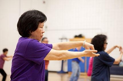 Woman doing tai chi at YMCA class
