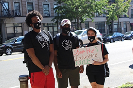 Teens wearing masks at a Black Lives Matter march