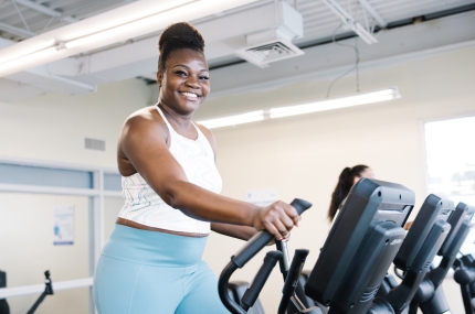 Woman smiling on treadmill