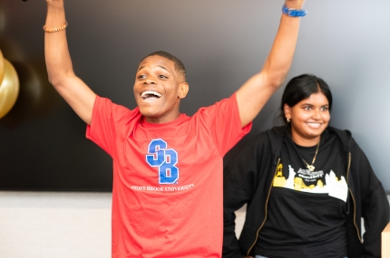 A Y Rowe Scholar announces they are going to Stony Brook University in the fall at College Decision Day