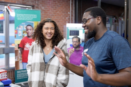 staff member talking to teen