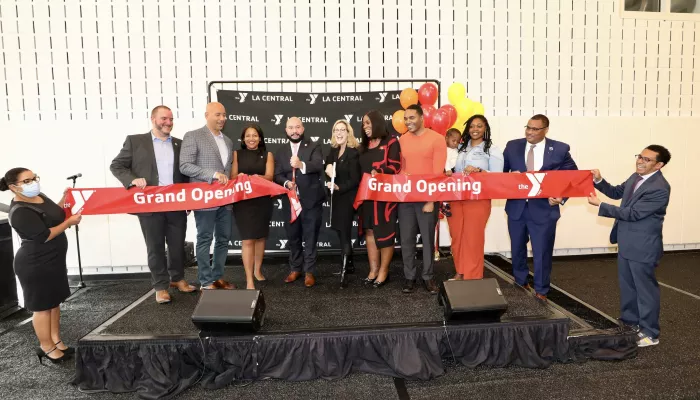 elected officials cut a ribbon
