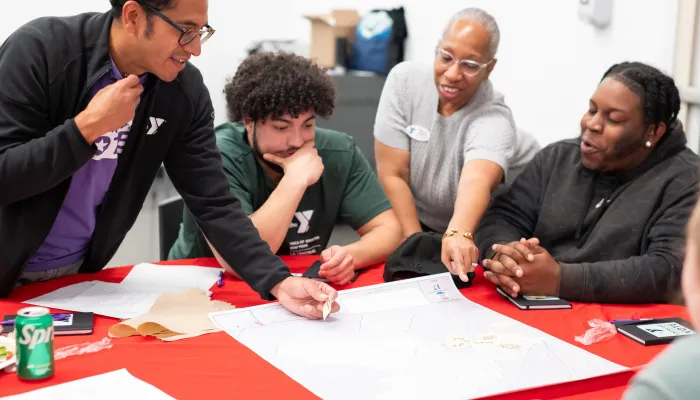 4 people around table