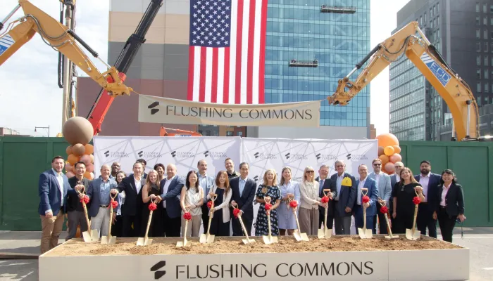 Group photo with shovels at construction site