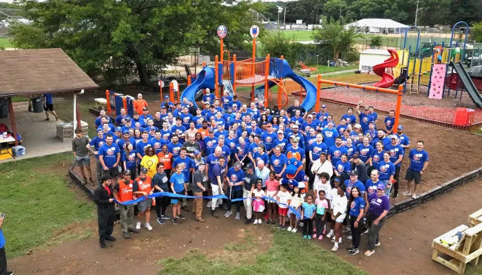 group photo in blue shirts