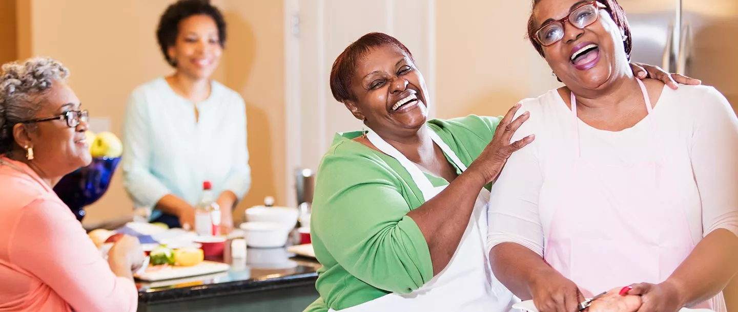 Group of women cooking healthy food