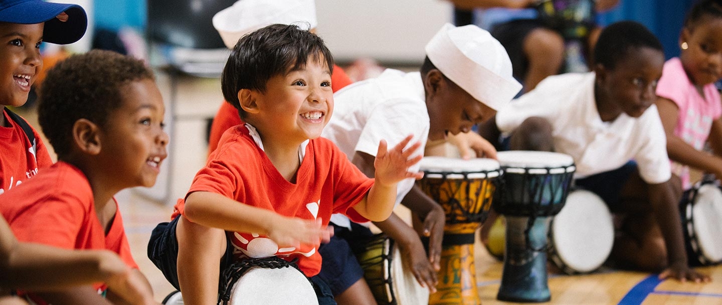 Summer camper drumming