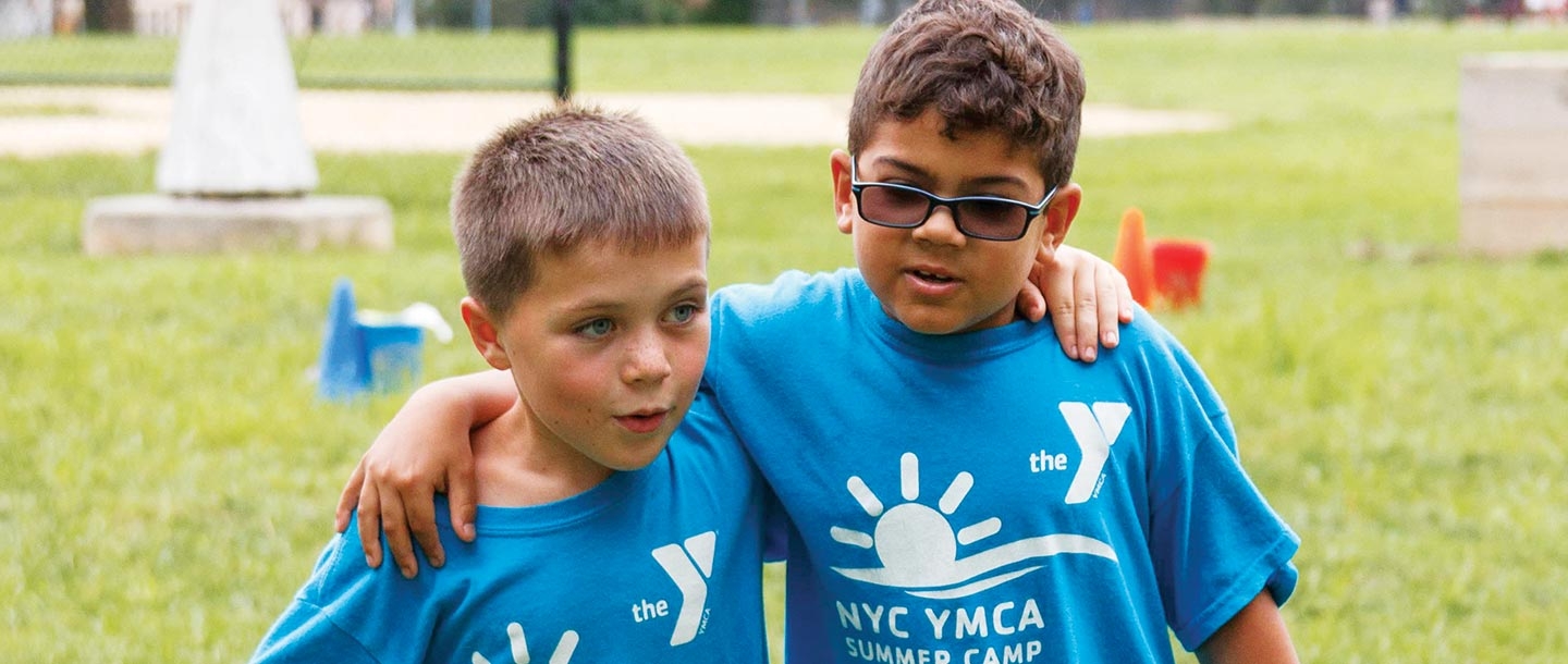 Two summer campers outside