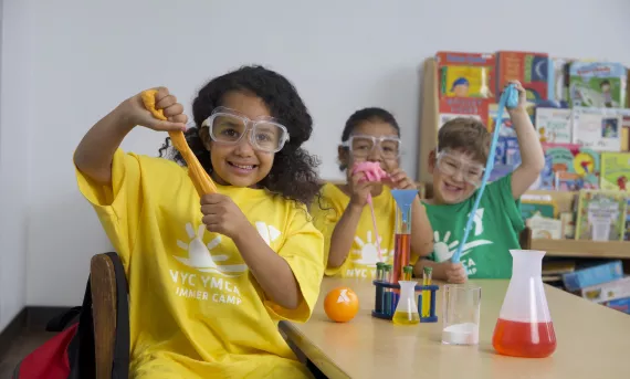 3 kids in a science camp