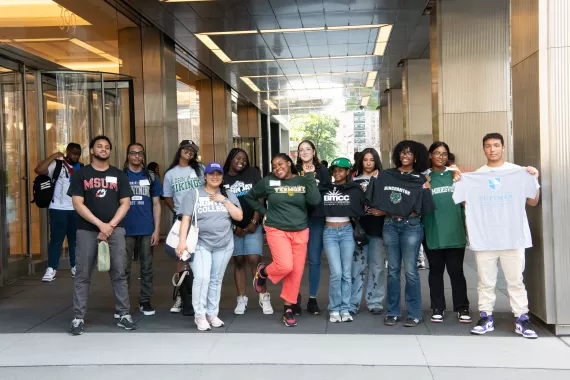 Teens gather outside of Capital Group for College Decision Day