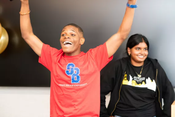 A Y Rowe Scholar announces they are going to Stony Brook University in the fall at College Decision Day