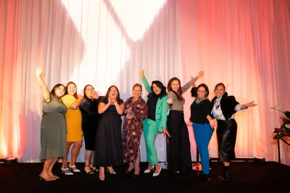 Women pose excitedly at the 2025 VIDA Awards.