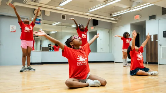 Y campers in studio stretching 