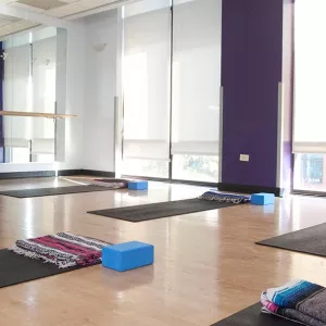 Group exercise studio with yoga mats and Pilates equipment at Dodge YMCA in Brooklyn