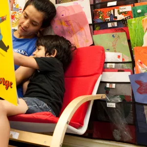Mother and son reading at YMCA