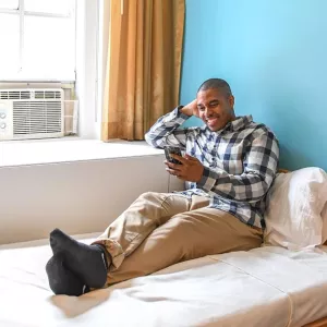 Guest at YMCA single room in Manhattan