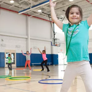 Girl doing sports at gymnasium in YMCA