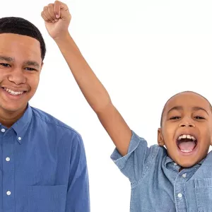 Two boys smiling about the YMCA