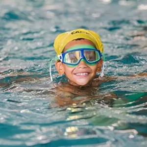 Boy swimming at Castle Hill YMCA indoor pool