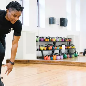 YMCA instructor demonstrates ski 