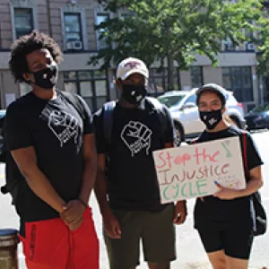 Teens wearing masks at a Black Lives Matter march