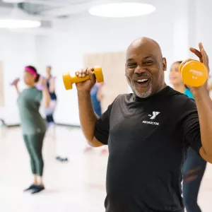 man holding weights