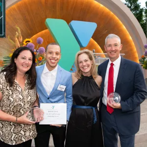Y CEO with event honorees