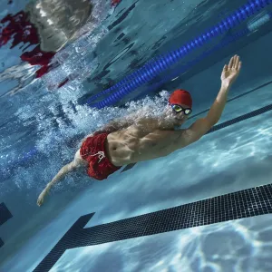 guy underwater in pool