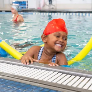 girl smiling in pool