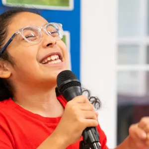 girl singing with mic