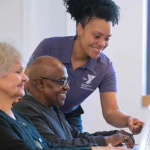 computer teacher with students