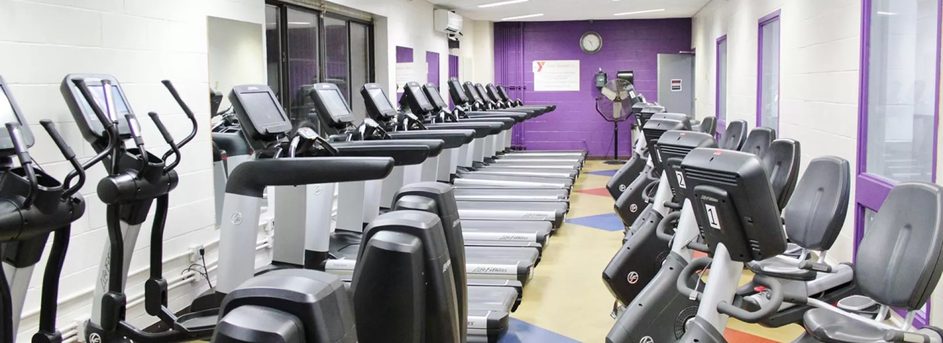 Treadmill and bike cardio equipment at the Cross Island YMCA in Queens